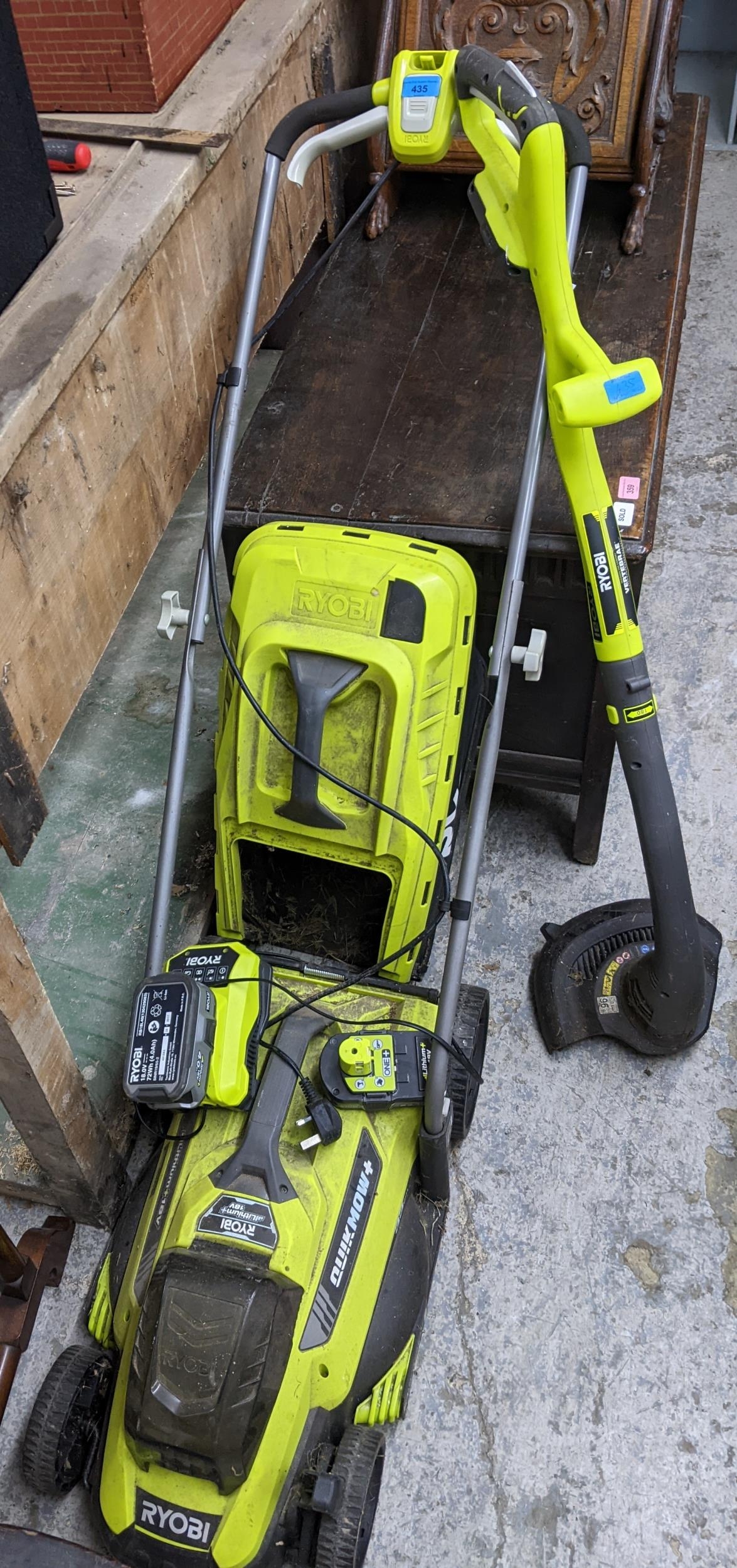 A Ryobi lawnmower and strimmer Location: