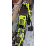 A Ryobi lawnmower and strimmer Location: