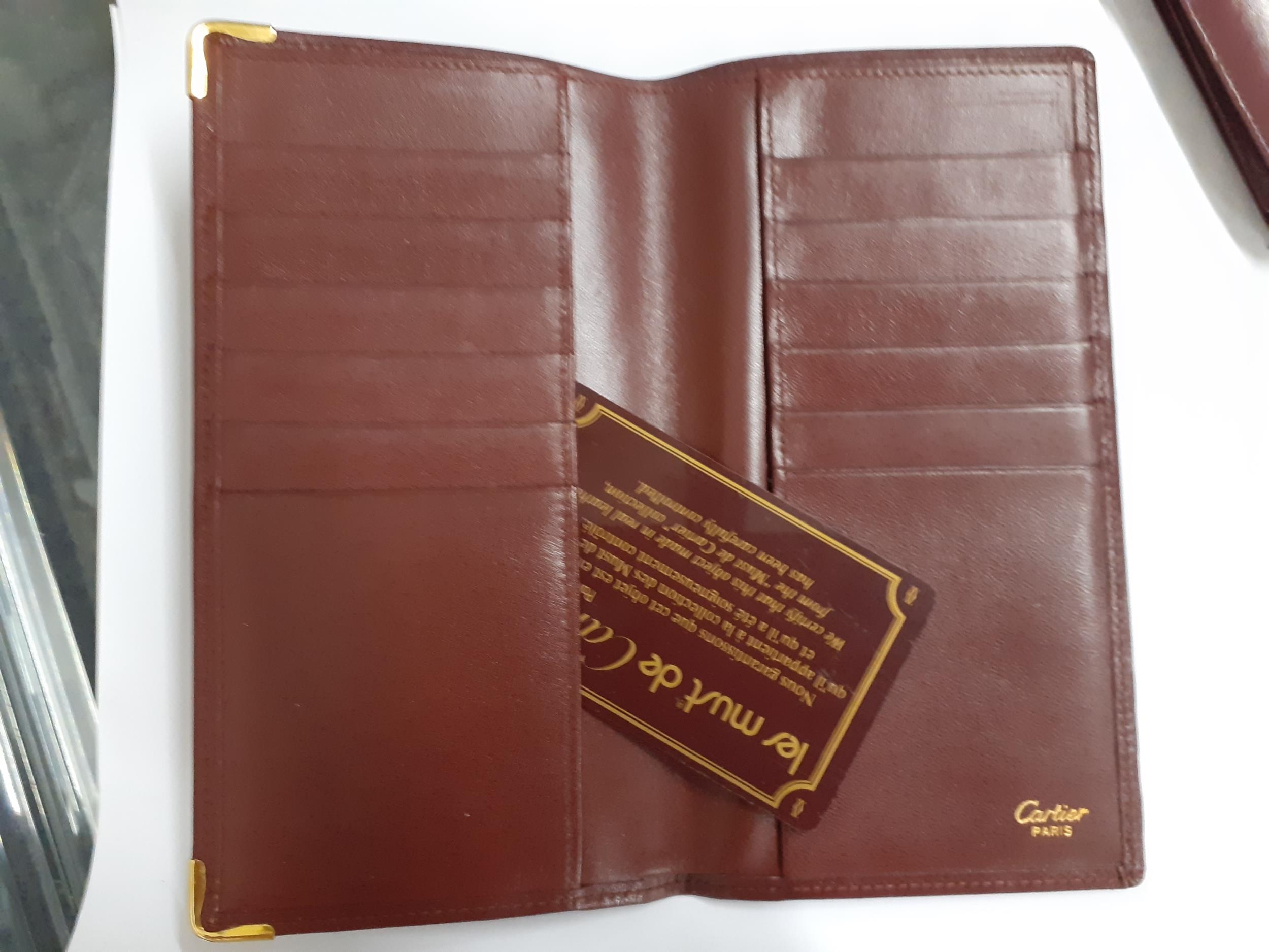 Must de Cartier - a vintage burgundy leather card wallet with certificate of authenticity and - Image 2 of 2