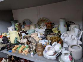A selection of early 20th century and later ceramics to include a Denby snub nose rabbit, Radford