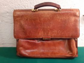 The Bridge-A congo brown leather attache briefcase with 4 zipped compartments, 2 large open sections