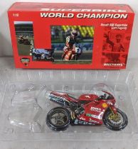 A boxed Minichamps World Champion Carl Fogarty Ducati 996 Superbike model Location: