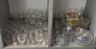 A mixed lot of glassware to include various drinking glasses, crystal cut decanter, crystal cut vase