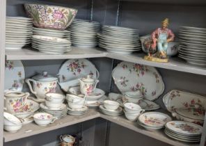 A Limoges Raynaud dinner /tea service to include cups and saucers a pair of treens, dinner plates