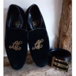 Hermes-A pair of unisex black velvet flats with gold embroidered monogram to the upper having a