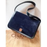 Celine-A vintage Celine Triomphe navy leather and suede single flap handbag having gold tone