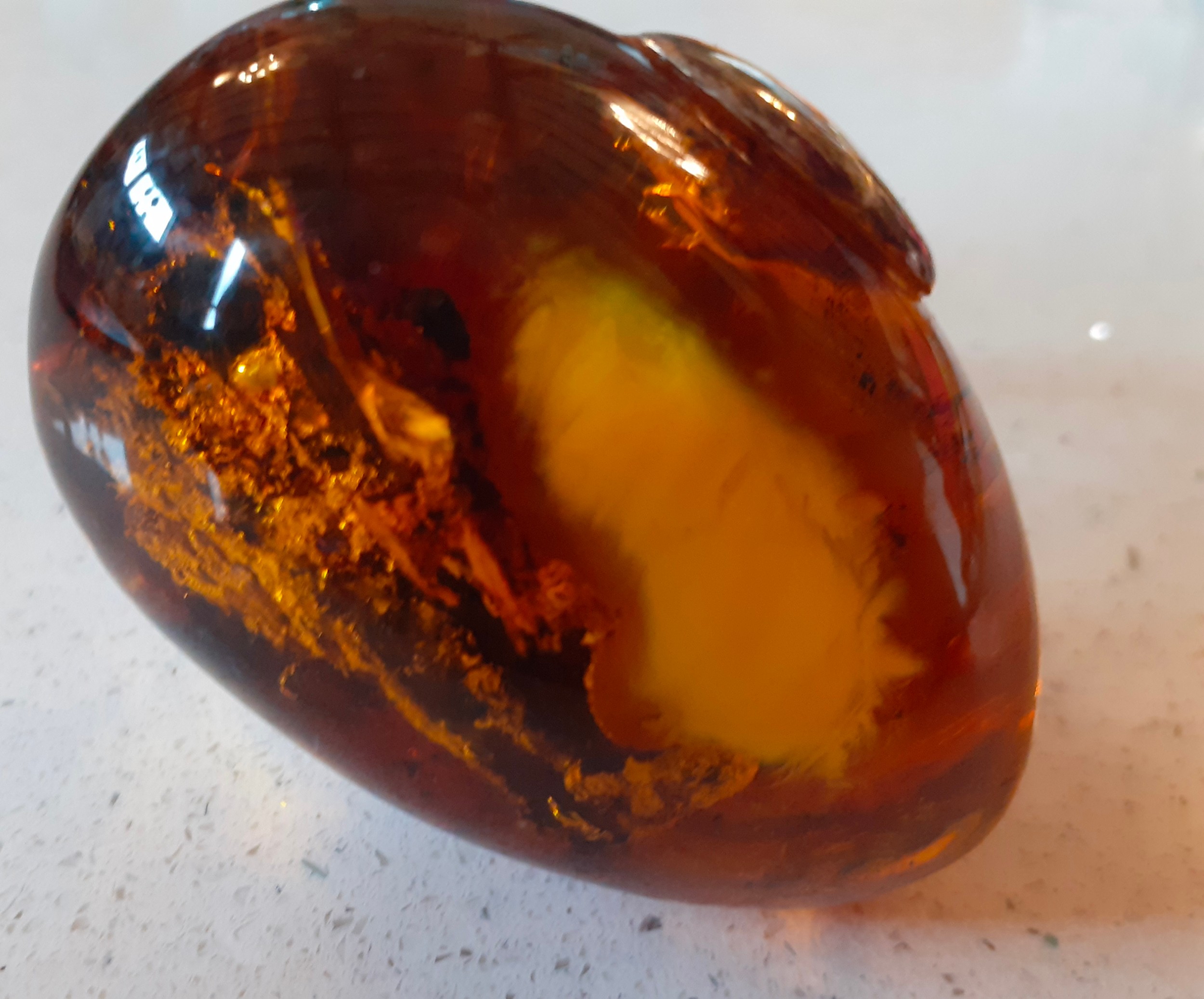 A contemporary oversized amber ring on silver mount, stamped 925 together with a Baltic green - Image 5 of 9