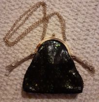 Lalique-A vintage black evening bag with gold tone chain and tassel additions with beads, sequin