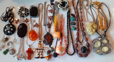 A quantity of vintage costume jewellery, mainly late 20th Century to include a Baltic amber cross