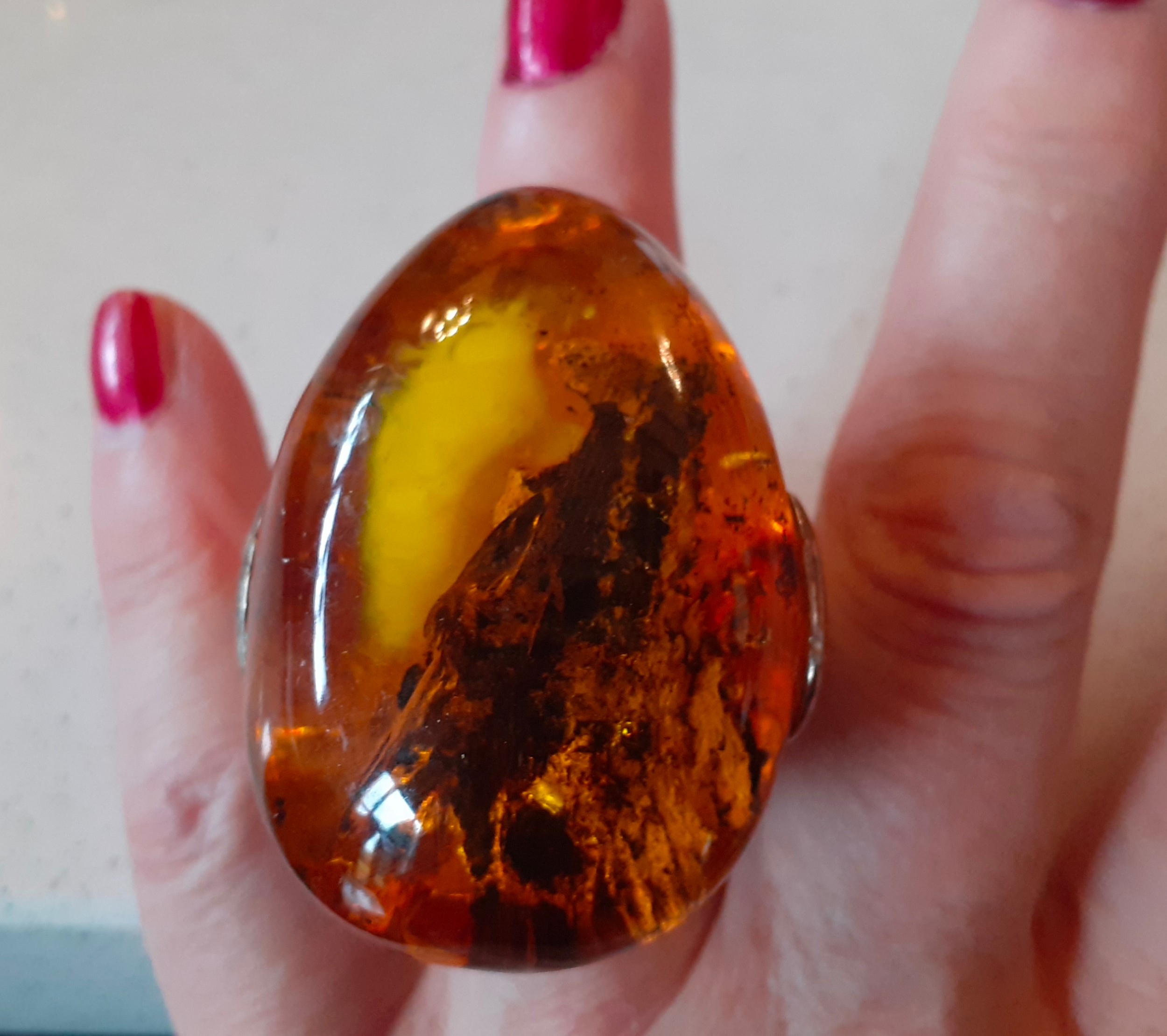 A contemporary oversized amber ring on silver mount, stamped 925 together with a Baltic green - Image 2 of 9