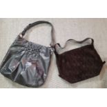 Michael Kors- A silver glitter effect boho shoulder bag with silver tone hardware and branded lining