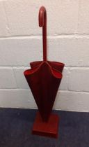 Thomas Goode-A red crocodile leather umbrella stand in the form of an upside down umbrella on a