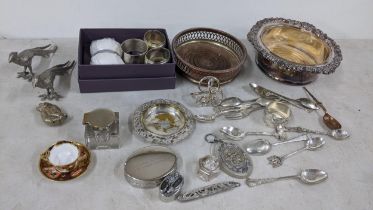 A mixed lot to include a miniature Derby Imari cup and saucer, silver plated wine coasters, pill