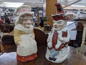 Two late 19th century lidded caricature jugs to include punch Location: