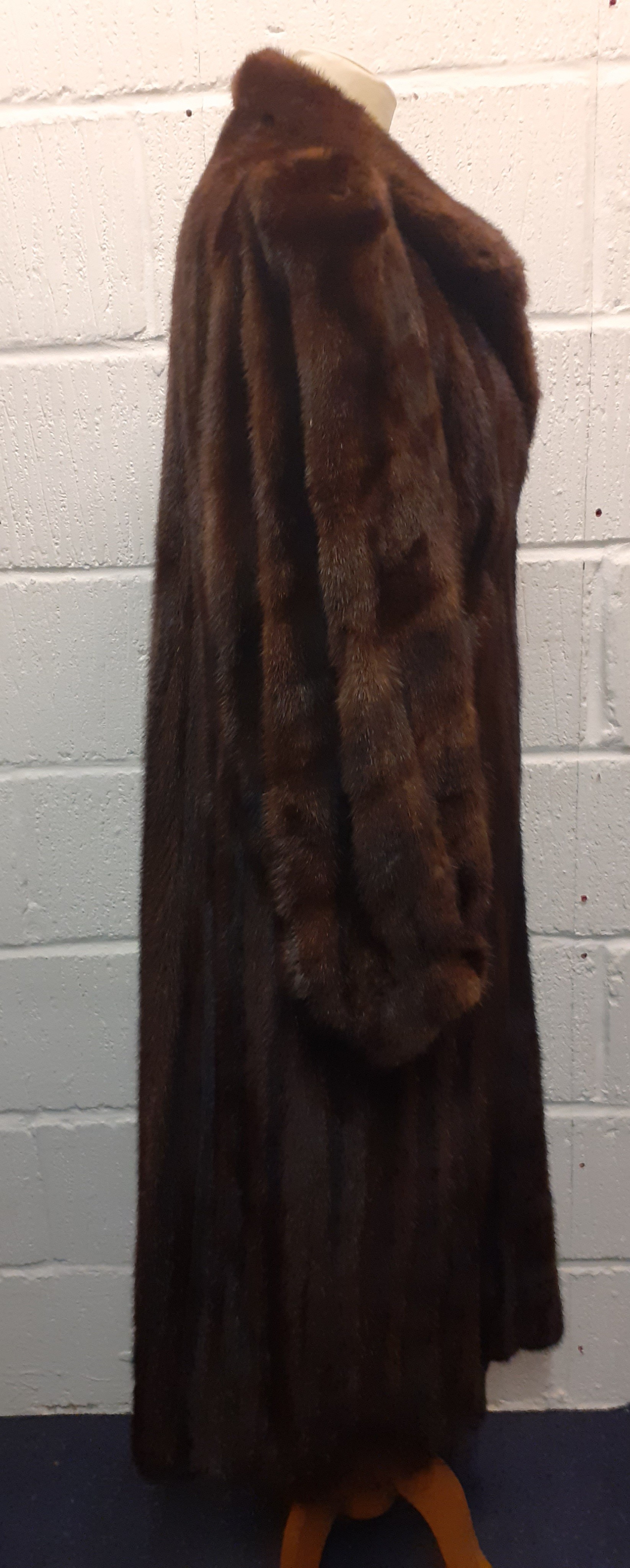 A late 20th Century brown mink full length coat having Juliet sleeves with cuffs, 49" long x 38" - Image 3 of 7
