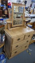 A Victorian pine dressing table having a swing mirror above two short and two long drawers, 161cm