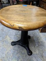 A Singer cast iron and mahogany stool Location: