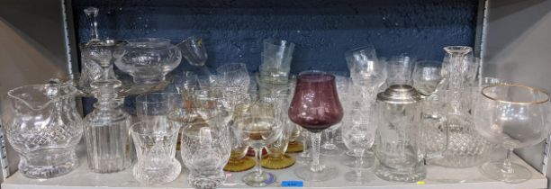 Mixed glassware to include an etched glass decanter, cut crystal glasses, decanter and other items