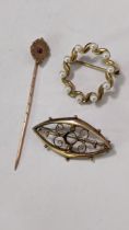 Three 9ct gold brooches to include one having ten seed pearls, total weight 5.6g Location: R2.4