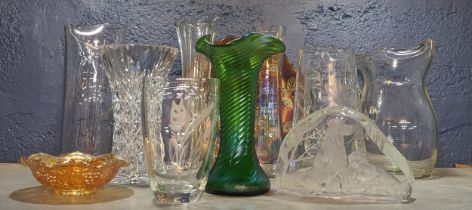 Mixed studio and other glass to include an iridescent green Leotz twist vase, cut crystal vase,