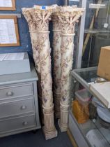 Four plaster pillars with mask, fruiting vine and reeded ornament, 158cm h Location:
