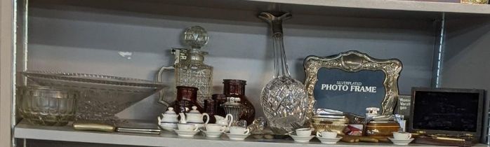 A mixed lot to include silver plated items, a decanter, vintage Bovril bottles together with various