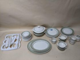 Susie Cooper part dinner set decorated with a continuous band of flower and leaf pattern, light