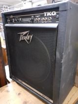 A Peavey TKO 115 Black Widow amp with cables. Location:G