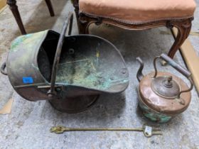 A helmet copper coal scuttle, a copper kettle, and a brass toasting fork Location: