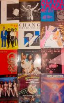 A quantity of mainly 1980's 12" records and a selection of LP's to include American Rock Band