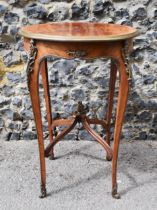 A Louis XV ormolu mounted bois de violette (kingwood) and bois de bout marquetry side table, after