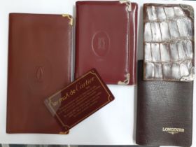 Must de Cartier - a vintage burgundy leather card wallet with certificate of authenticity and
