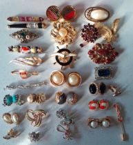 Late 20th Century vintage brooches and clip on earrings to include a pair of Orena gold tone