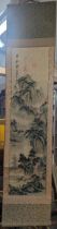 A mid 20th century Chinese silk scroll depicting a mountain scene with calligraphy to top Location: