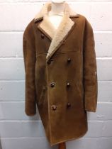 A vintage gents sheepskin coat. Location:Rail
