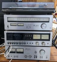 A Technics stereo stacking system (no plugs) Location: G