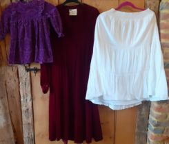 A quantity of 1960's-early 1980's mixed clothing to include a vintage Laura Ashley maroon soft