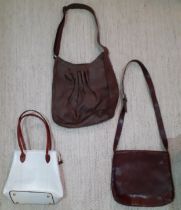 Three modern bags comprising a white La Moda textured leather shoulder bag having suede interior and