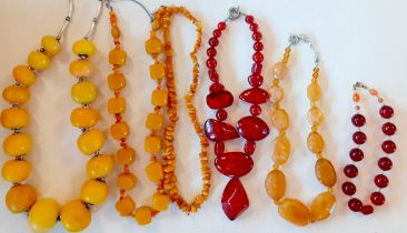 A vintage butterscotch amber necklace comprising square form beads and rough cut beads together with