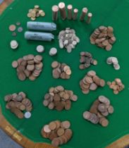 A quantity of mixed coins to include uncirculated tubes of two and one pennies, a silver National