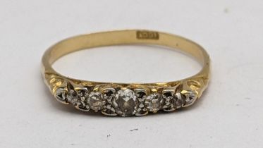 An 18ct gold an five stone diamond ring 2g Location:
