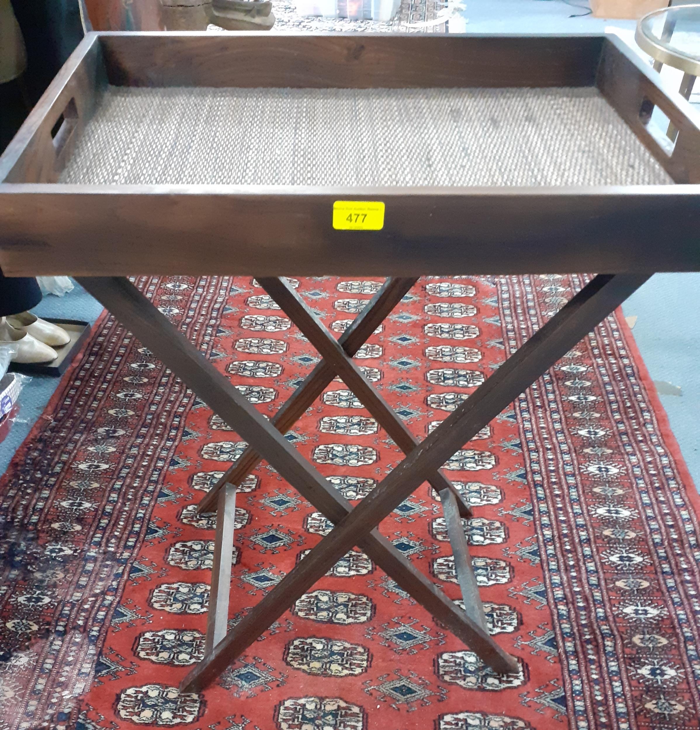 A late 20th century hardwood butlers tray on folding stand, Location: RAM