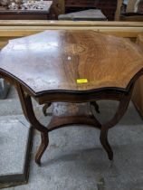 A Victorian inlaid faux ivory, rosewood centre table on square legs on porcelain castors 71cm h x