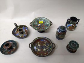 A group of seven early 20th century Gouda pottery items to include a twin handled pedestal bowl, and