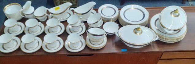 A Royal Doulton Harlow pattern part dinner and dinner service. Condition: one tureen repaired and