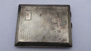 A 1920s silver engine turned cigarette case with empty cartouche and gilded interior 148g Location:
