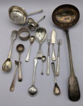 Mixed silver to include a toddy ladle (no handle) caddy spoon and other items 150.1g together with