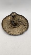 A white metal Mexican sombrero hat having embossed design, total weight 190.8g, Location: