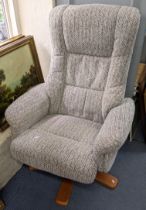 A modern swivel armchair on five splayed legs Location: