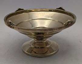 An early / mid 20th century silver footed bowl with a ribbed design and a raised edge 76.6g